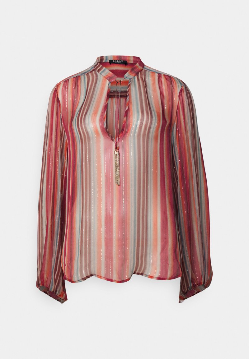 Durchsichtige Bluse mit langen Ärmeln und vertikalen, mehrfarbigen Streifen in Rot, Rosa und Blau. Verfügt über einen Schlüsselloch-Ausschnitt und eine dekorative Quaste.