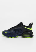Schwarzer und dunkelblauer Nike-Sneaker mit neongrünen Akzenten und Luftpolstersohle, seitlich auf weißem Hintergrund dargestellt.