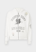 Weißer Zip-Hoodie mit grafischem Text "HEAVEN SENT LOS ANGELES 1971", einem Adlerdesign und dekorativen Patches, darunter eine Sonne und ein Spielkartenmotiv.