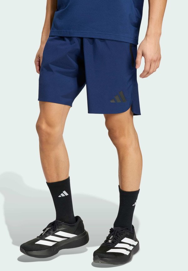 adidas Performance TIRO TRAVEL SHORTS - Sports shorts - team navy blue/black