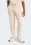 adidas Sportswear FUTURE ICONS THREE STRIPES - Tracksuit bottoms - cremeweiß