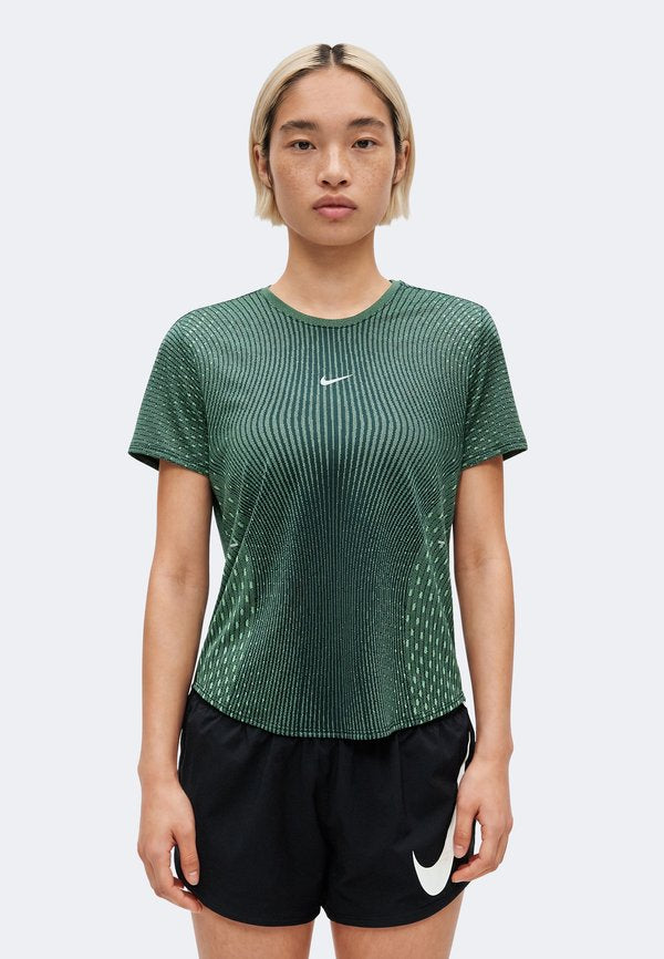 Nike Performance SWIFT - Sports T-shirt - black/light green spark