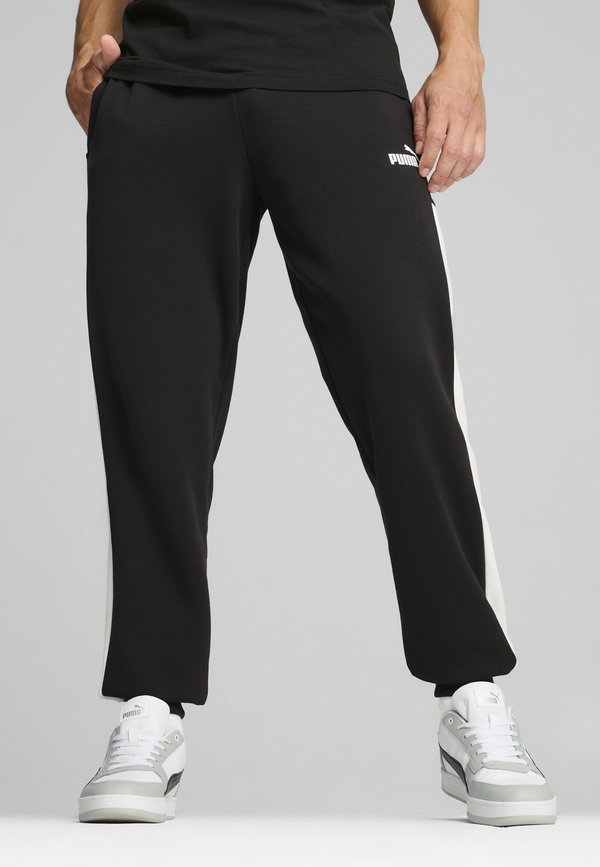Puma AROUND THE BLOCK - Tracksuit bottoms - black