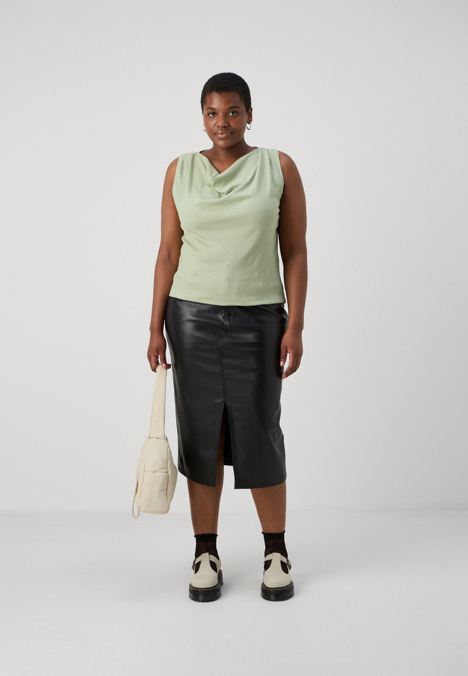 CARKIRI SLIT SKIRT Media 2