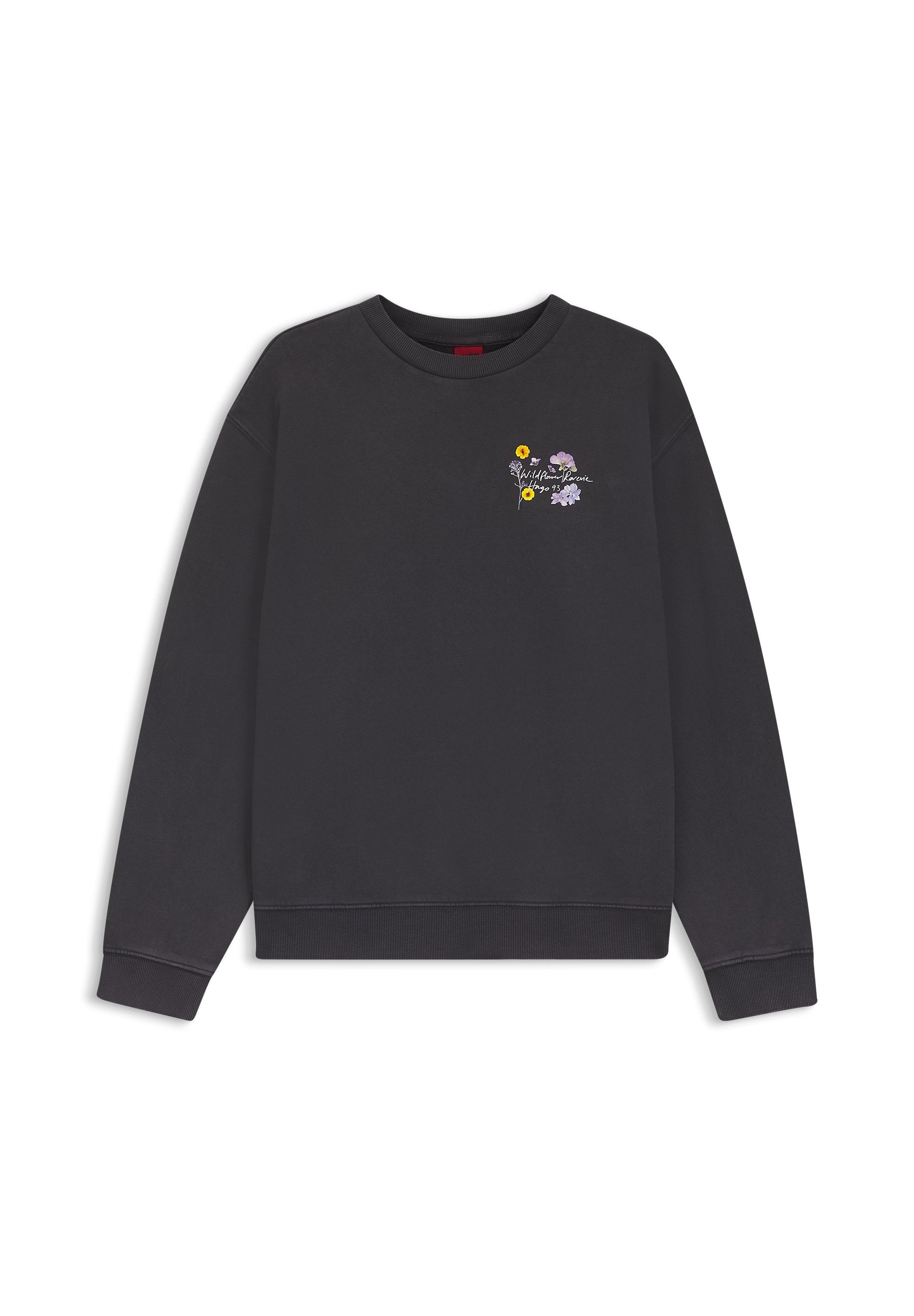 Dunkelgraues Sweatshirt mit Rundhalsausschnitt, kleinem floralen Stickereimotiv und dem Schriftzug "Wildflower Reserve est. 1975" auf der linken Brust.