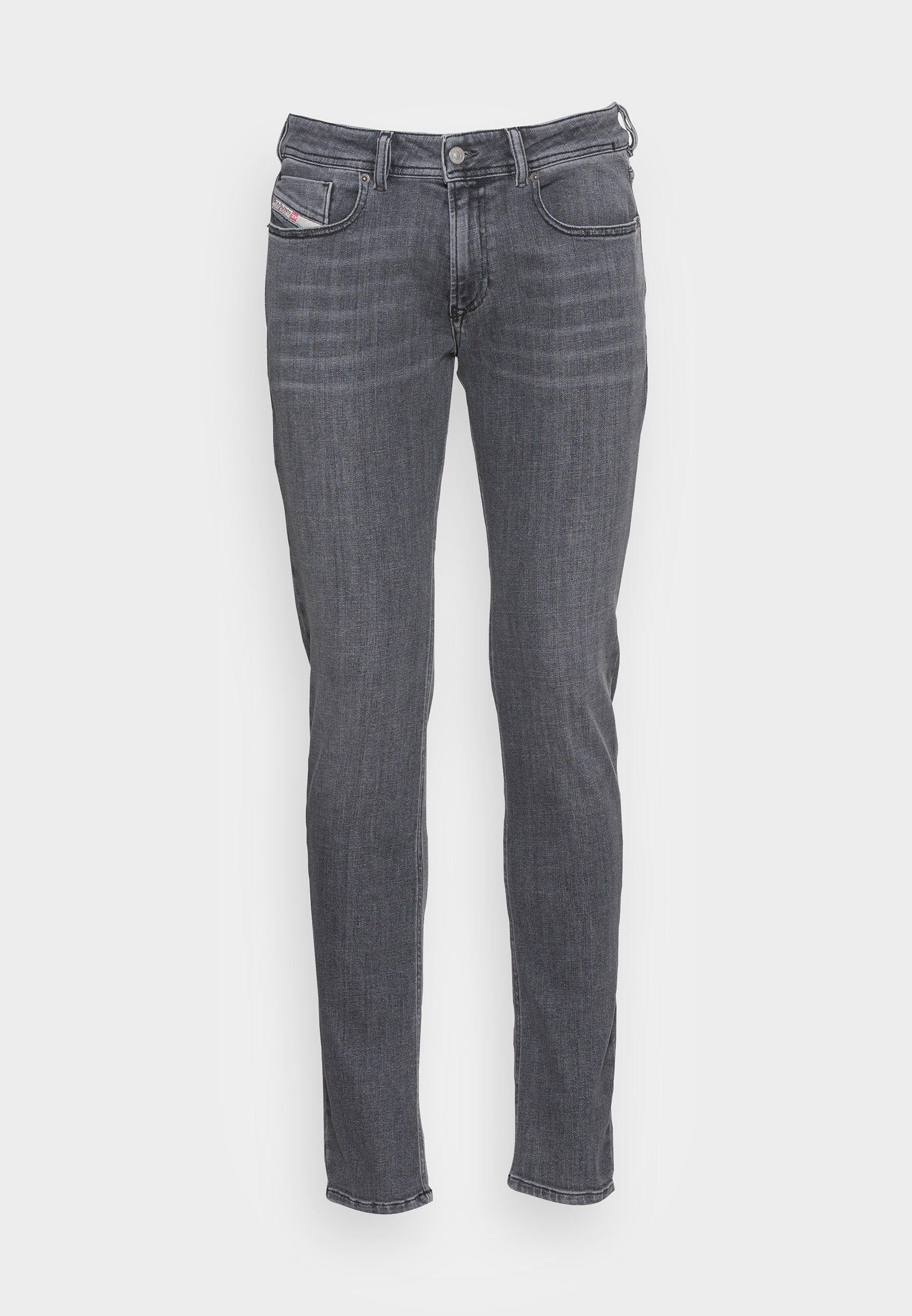 Graue Jeans aus Denim im Slim-Fit, mit einem 5-Taschen-Design und dezente Nähte entlang der Nähte. Klassischer Knopf- und Reißverschluss.
