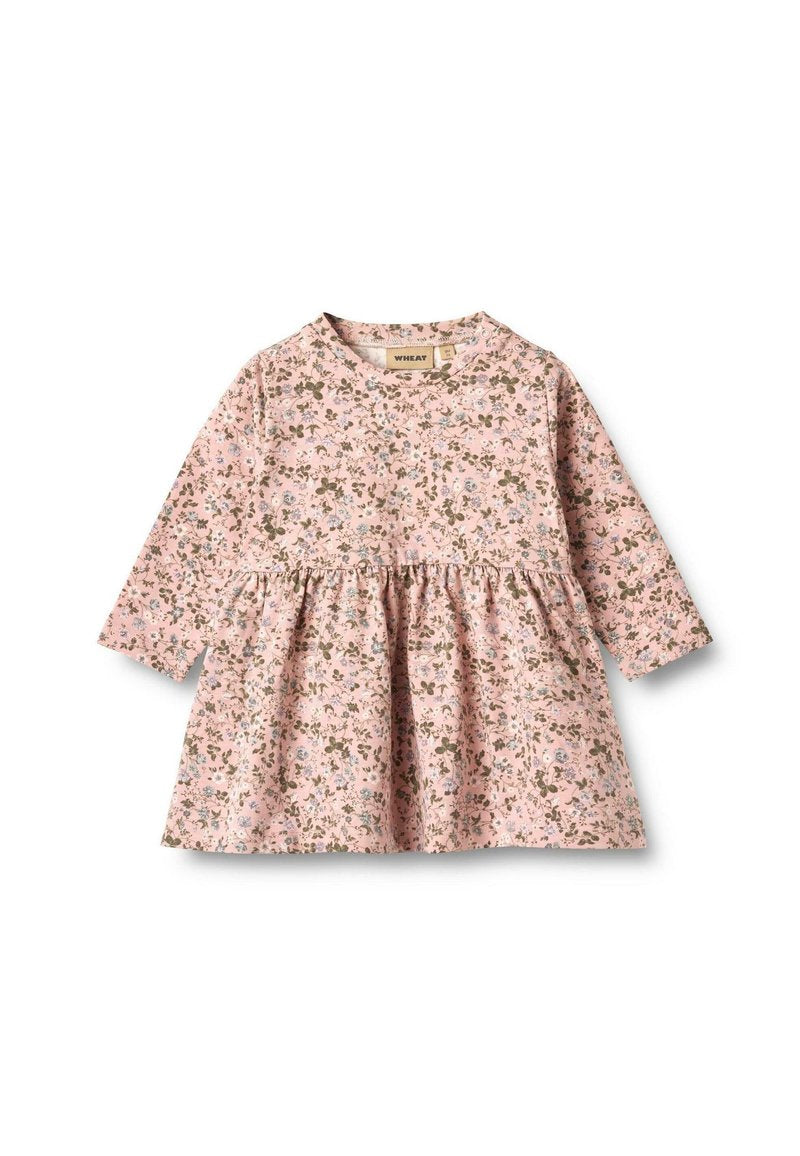 Rosa langärmeliges Kleid mit floralem Druck in Hellblau und Grün. Es hat einen runden Ausschnitt und einen ausgestellt Rock. Weicher Stoff.