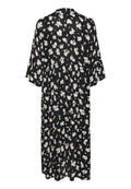 Schwarz-weißer Blumenmuster-Kleid. Mit kurzen, glockenförmigen Ärmeln und einem gefältelten Design, knielang, aus leichtem Stoff.
