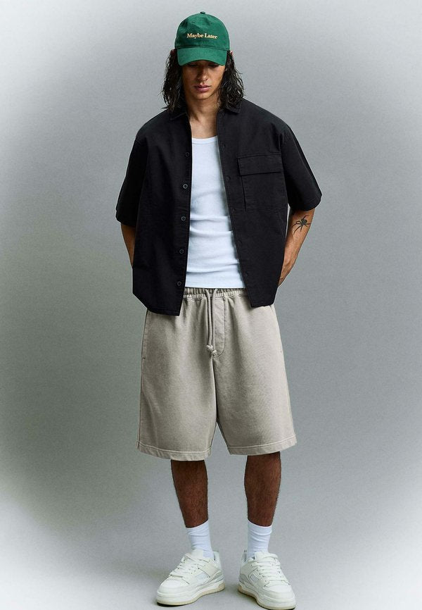 Bershka WASHED BERMUDA SHORTS - Tracksuit bottoms - grey