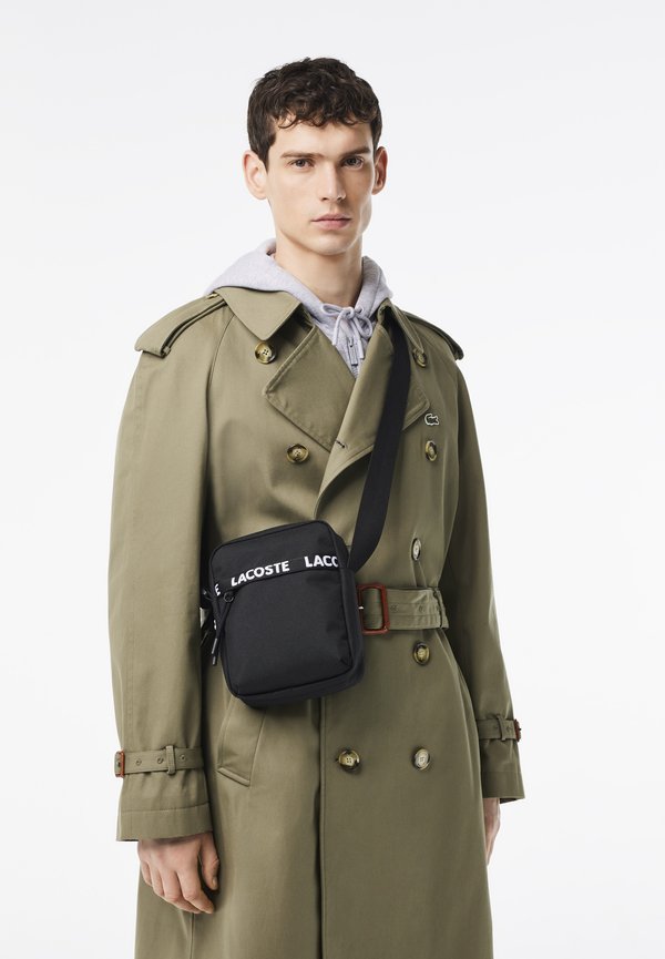 Lacoste NEOCROC SEASONAL UNISEX - Cross body bag - noir