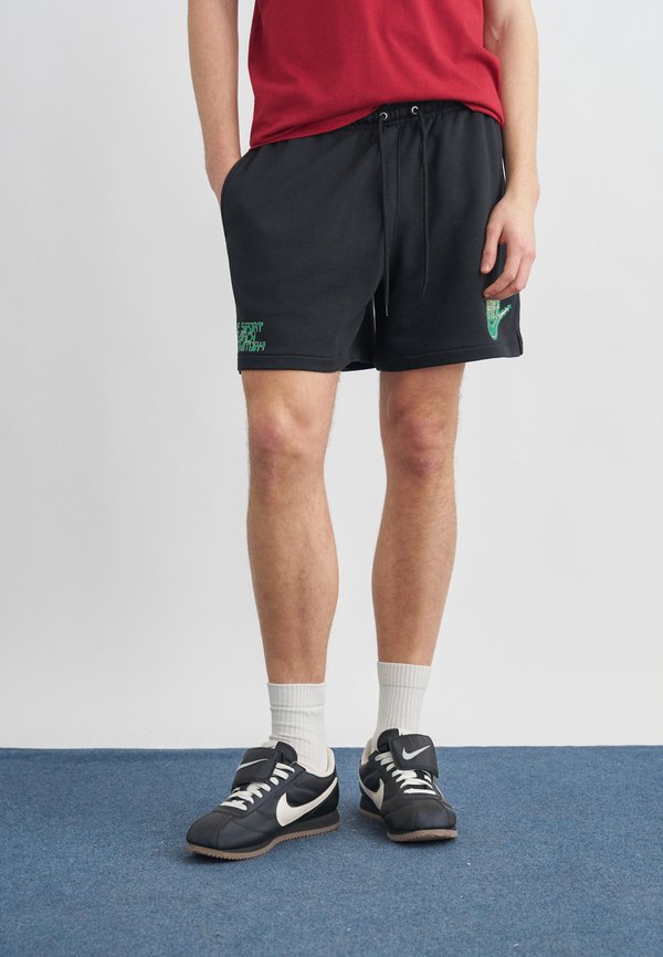 Nike Sportswear CLUB FLOW - Tracksuit bottoms - black/malachite