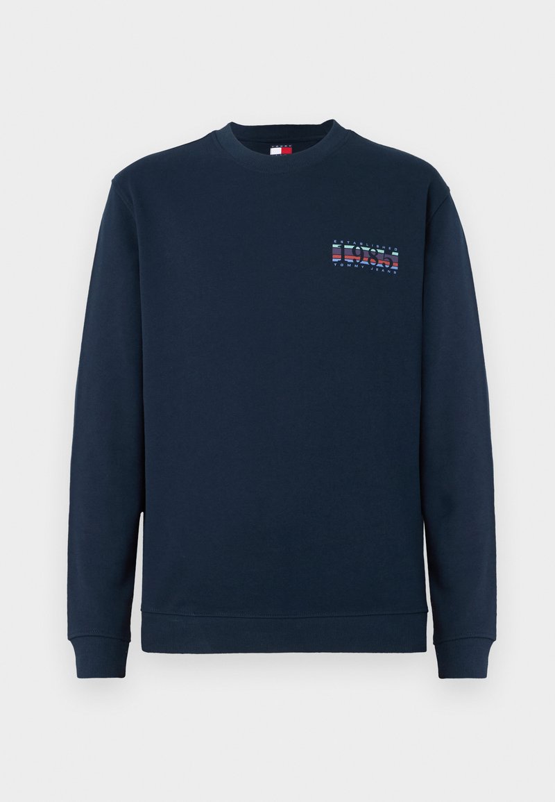 Marineblaue Rundhals-Sweatshirt mit langen Ärmeln, gerippten Bündchen und Saum, mit kleinem "1985 Tommy Jeans"-Logo auf der linken Brust.