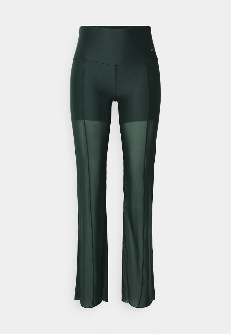 Dunkelgrüne Sporthose mit hoher Taille, aus einem glatten, elastischen Material gefertigt. Verfügt über transparente Einsätze an den Seiten und eine schmale Passform.