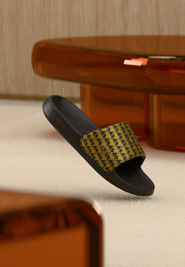 Lacoste SERVESLIDE 1.0 - Mules - black/gold-coloured