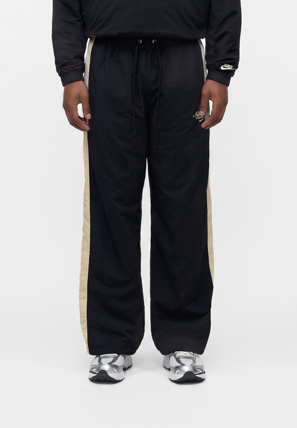 Nike Sportswear CLUB PANT - Tracksuit bottoms - black/sanddrift
