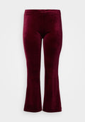 Weinrote, ausgestellte Leggings aus weichem, texturiertem Samt, mit einem glatten Bund und einer figurbetonten Silhouette bis zum Knie.