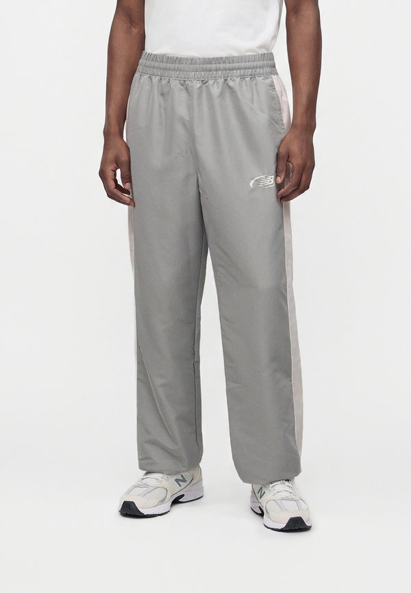New Balance TRACKSIDE WOVEN PANT - Tracksuit bottoms - slate grey