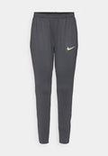 Graue Sporthosen mit elastischem Bund, schmal zulaufenden Beinen, Seitentaschen und einem kleinen gelben Nike-Logo auf der linken Seite.
