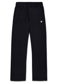 Schwarze, weite Sweatpants mit strukturiertem Finish. Verfügt über einen elastischen Bund, zwei Seitentaschen und ein kleines weißes Logo in der Nähe der Taille.