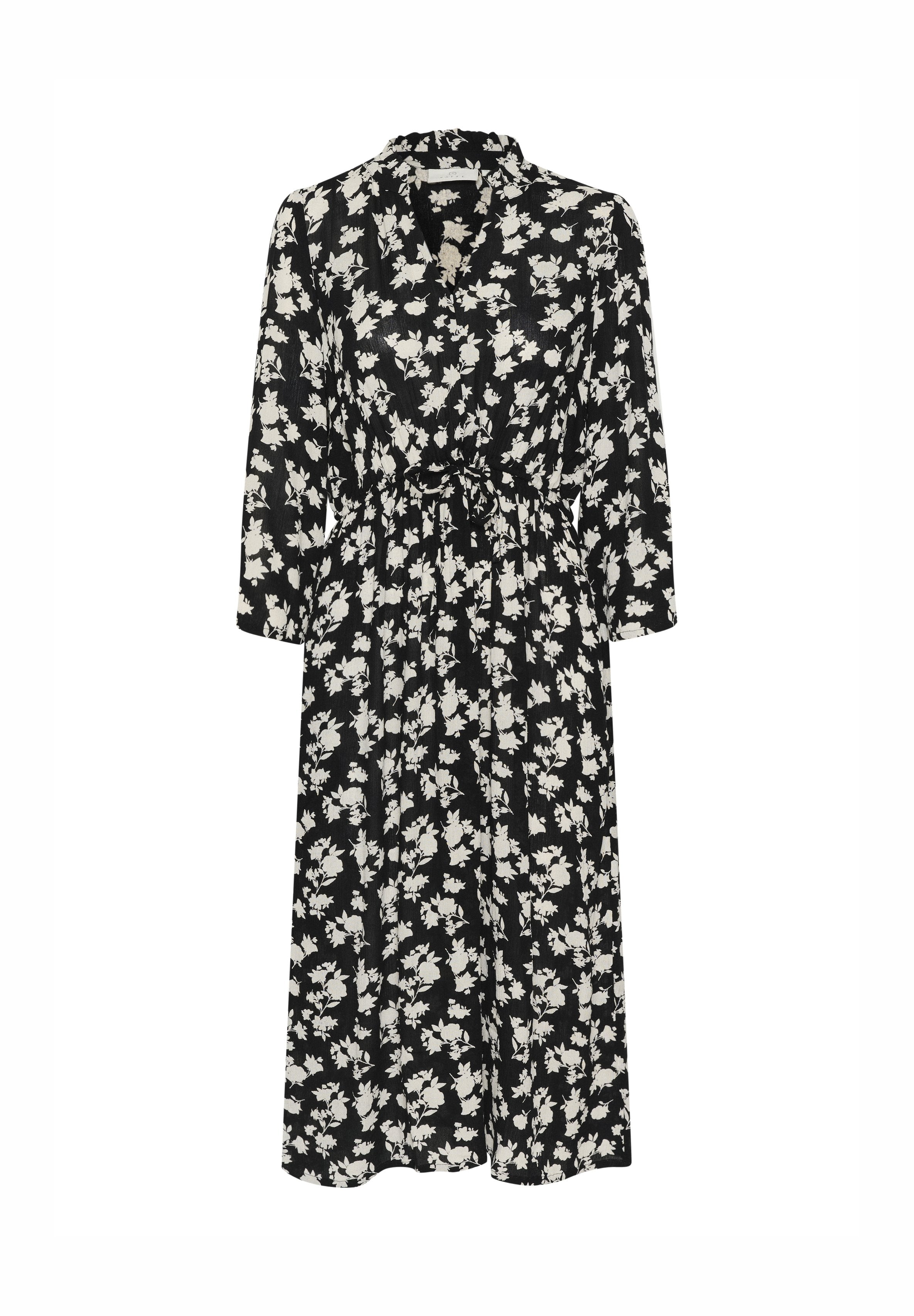 Schwarzes Blumenkleid mit langen Ärmeln, tailliertem Schnitt und Kragen. Besteht aus einem strukturierten Stoff mit weißen Blumenmustern.