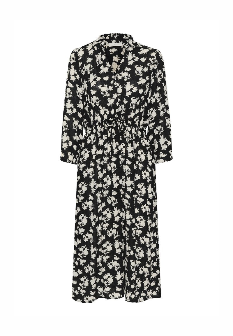 Schwarzes Blumenkleid mit langen Ärmeln, tailliertem Schnitt und Kragen. Besteht aus einem strukturierten Stoff mit weißen Blumenmustern.