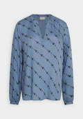 Hellblaues Langarmshirt mit V-Ausschnitt und schwarzem Blumenmuster. Verfügt über eine lockere Passform und geraffte Bündchen. Glattes, leichtes Material.