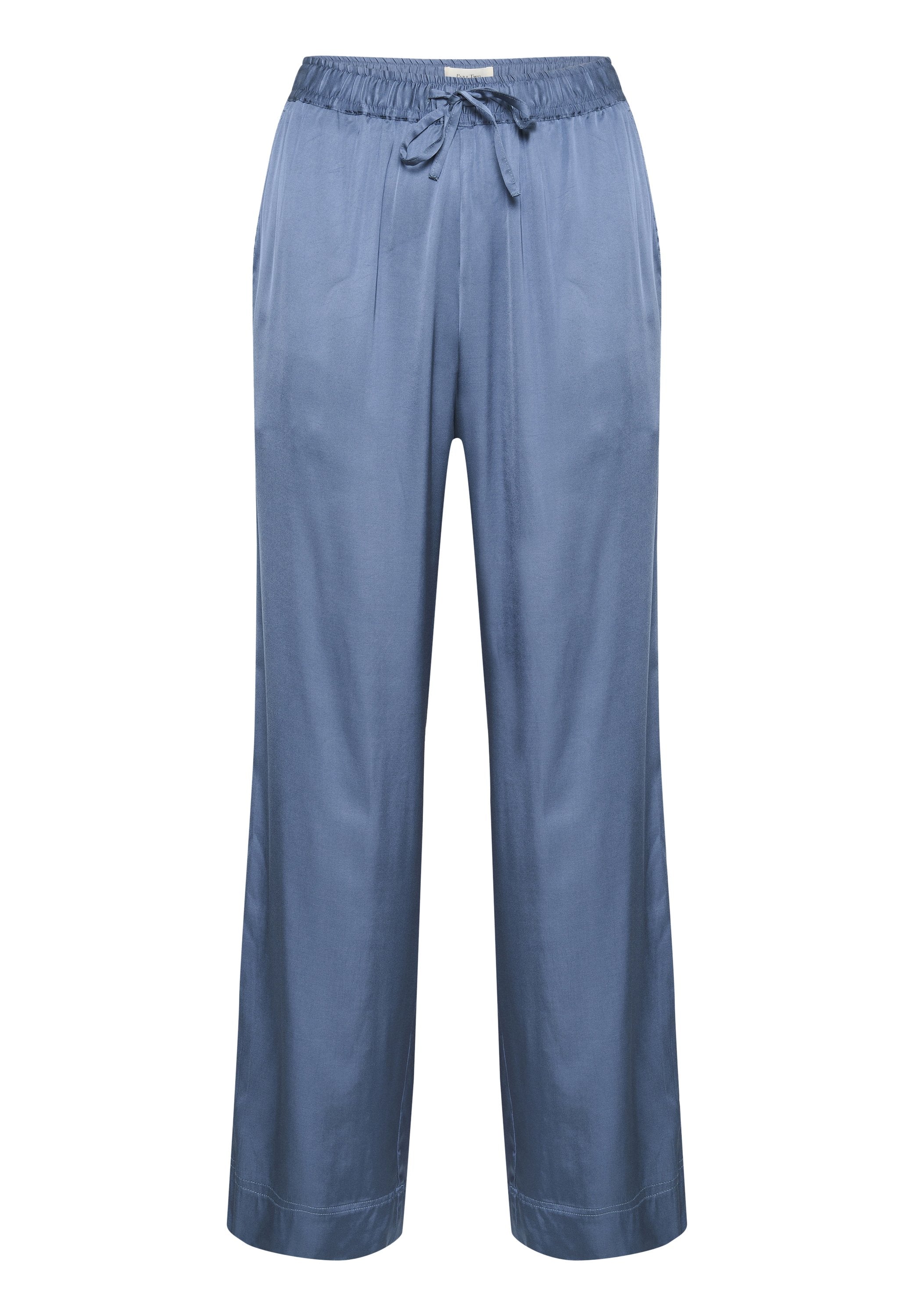 Helle blaue weit geschnittene Hosen mit einem elastischen Bund und einer Frontknotendetail, aus glattem, fließendem Stoff.