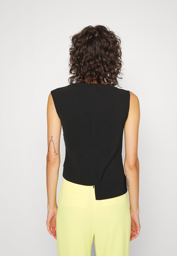 A.W.A.K.E. MODE CRISS CROSS WIDE STRAP IN THE FRONT