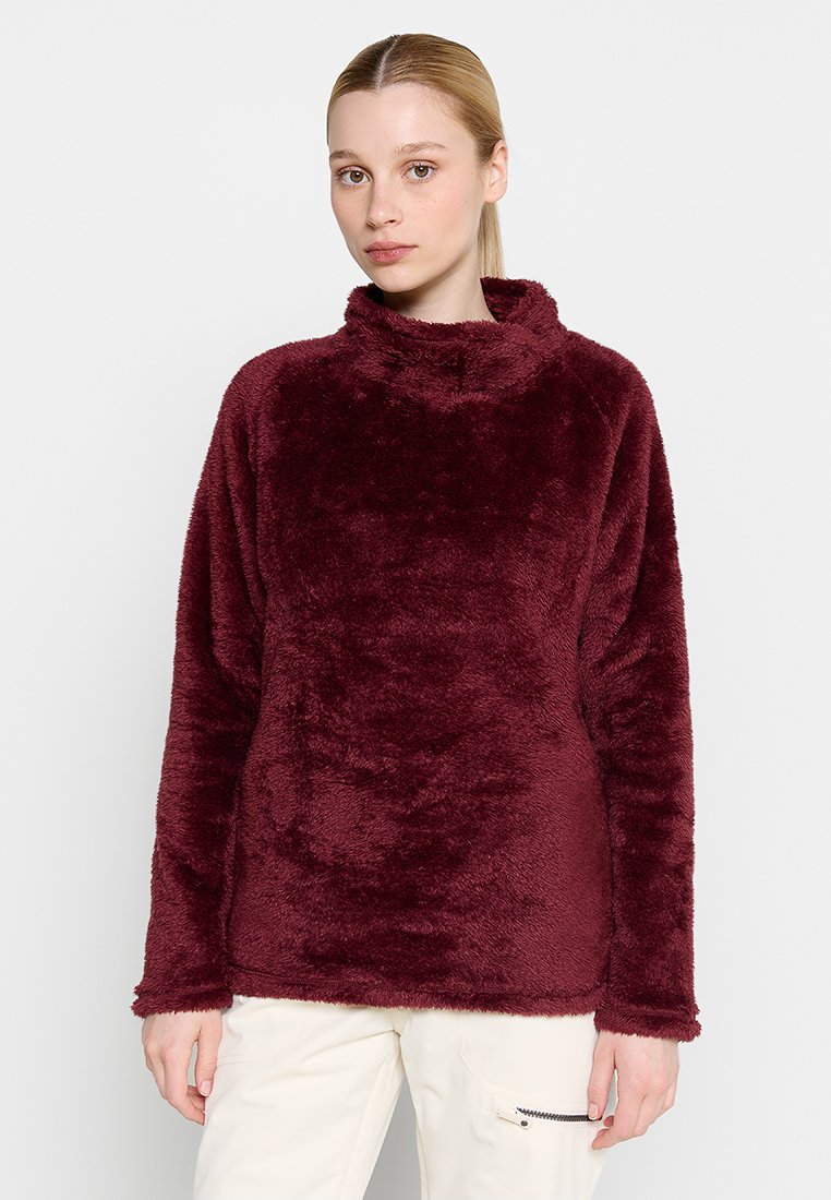 Burgunderfarbener Fleece-Pullover mit hohem Kragen, langen Ärmeln und weichem Material. Der Stoff wirkt plüschig mit einer glatten Oberfläche.