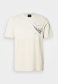 Baumwoll-T-Shirt in Cremefarbe mit kurzen Ärmeln, das auf der linken Brust ein grafisches Design mit Pfeilmustern in Rosa und Schwarz zeigt.