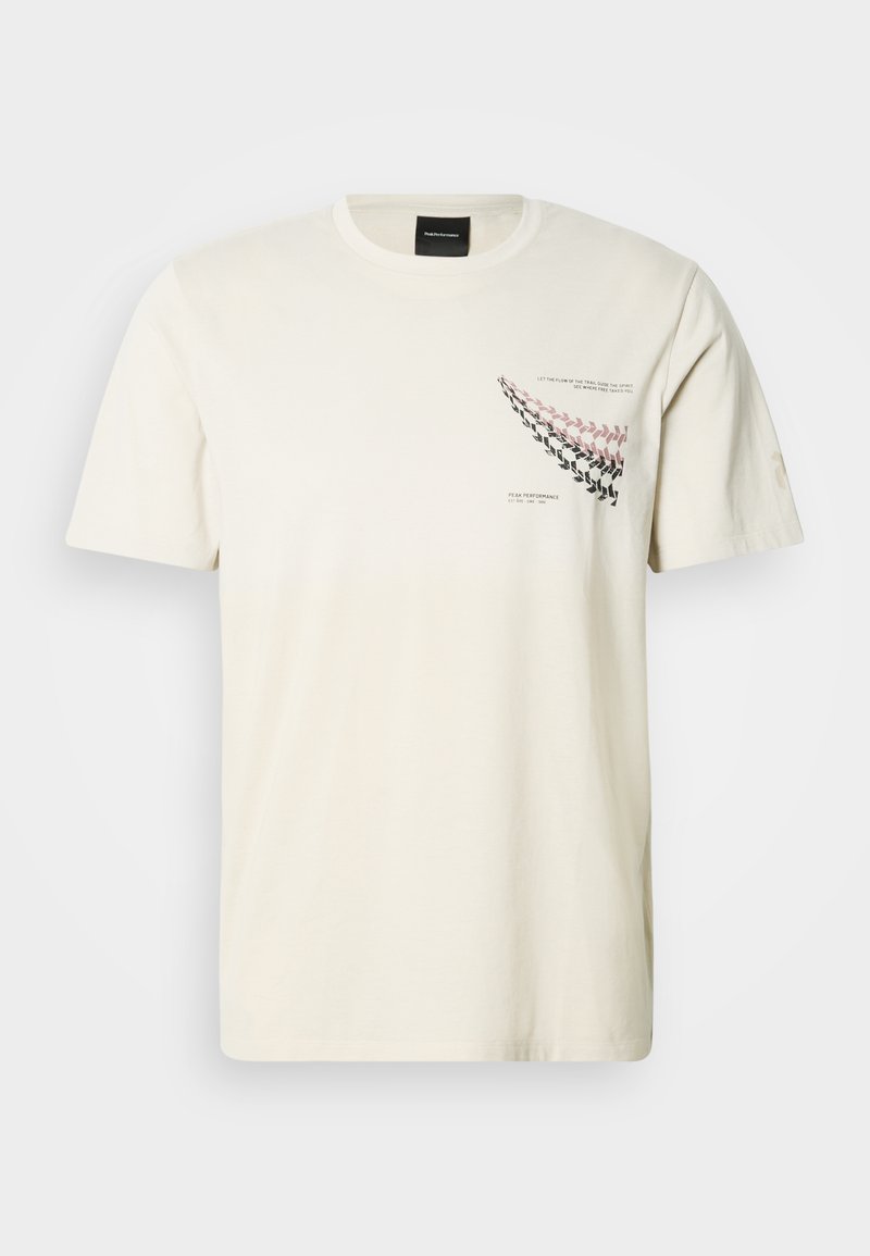 Baumwoll-T-Shirt in Cremefarbe mit kurzen Ärmeln, das auf der linken Brust ein grafisches Design mit Pfeilmustern in Rosa und Schwarz zeigt.