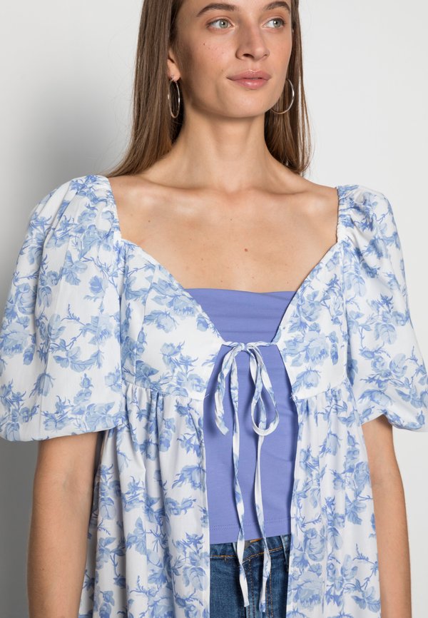 IN THE STYLE LORNA LUXE BLUE FLORAL PUFF SLEEVE TIE FRONT LONGLINE BLOUSE