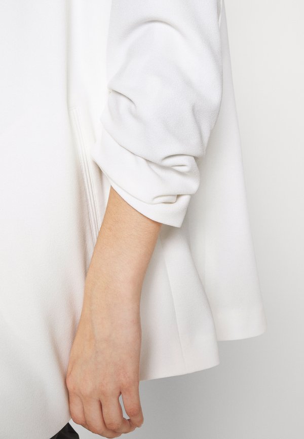 DKNY FOUNDATION OPEN FRONT JACKET POCKETS