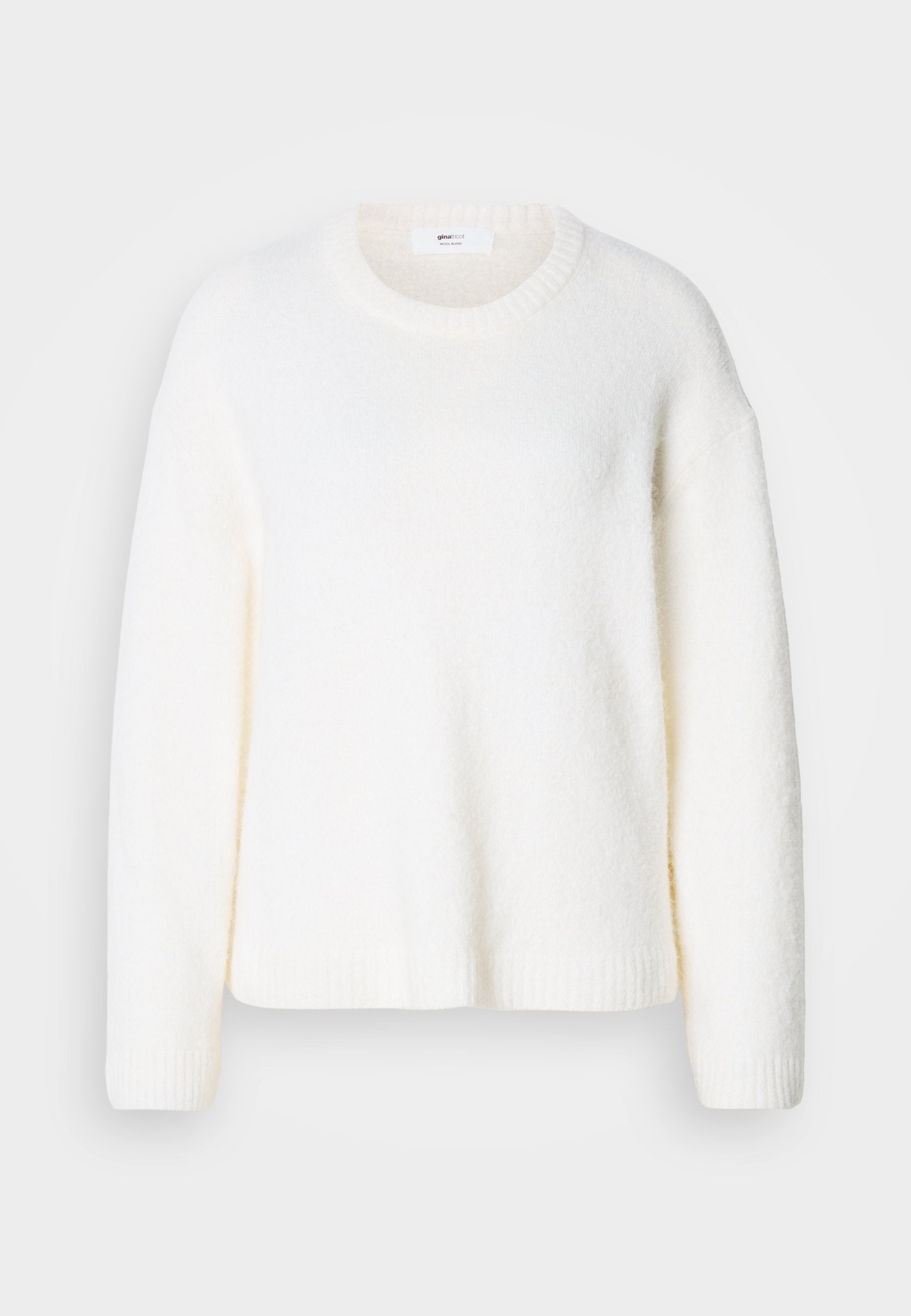 Weißer, weich strukturierter Pullover mit Rundhalsausschnitt, farblich abgesetzten Schultern sowie gerippten Bündchen und Saum. Schlichtes, unverziertes Design.