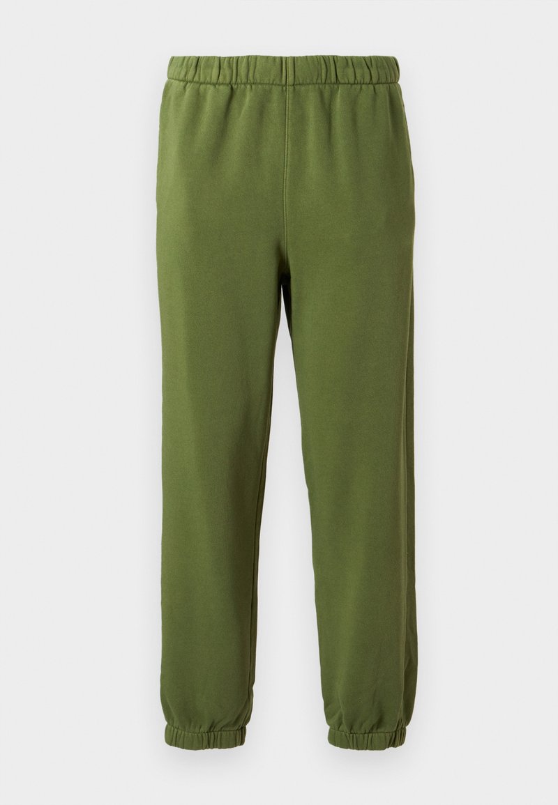 Grüne Jogginghose aus weichem Stoff. Elastischer Bund und Bündchen. Gerade Beinform ohne Muster oder sichtbare Hardware.