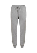 Graue Jogginghose mit elastischem Bund, verstellbarem Kordelzug und engen Bündchen. Hergestellt aus weichem Stoff mit schlichter Gestaltung.