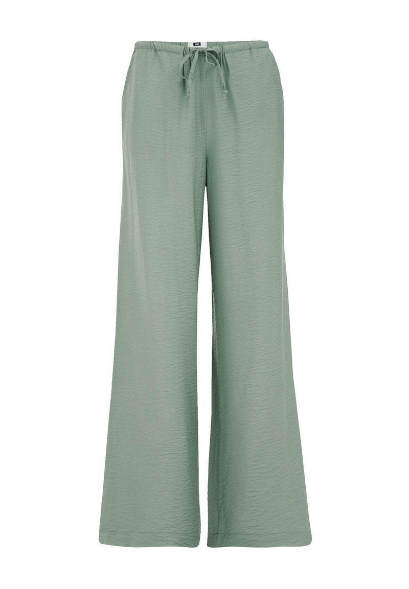 Hellgrüne, weit geschnittene Hose mit elastischem Taillenbund und Kordelzug. Strukturiertes Material mit fließendem Design. Keine Taschen oder sichtbaren Muster.