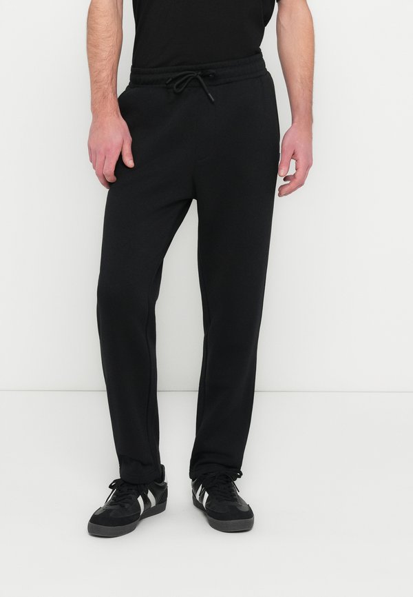 Jack & Jones JPSTKANE BRADLEY UNCUFFED SWT PANTS NOOS - Tracksuit bottoms - black