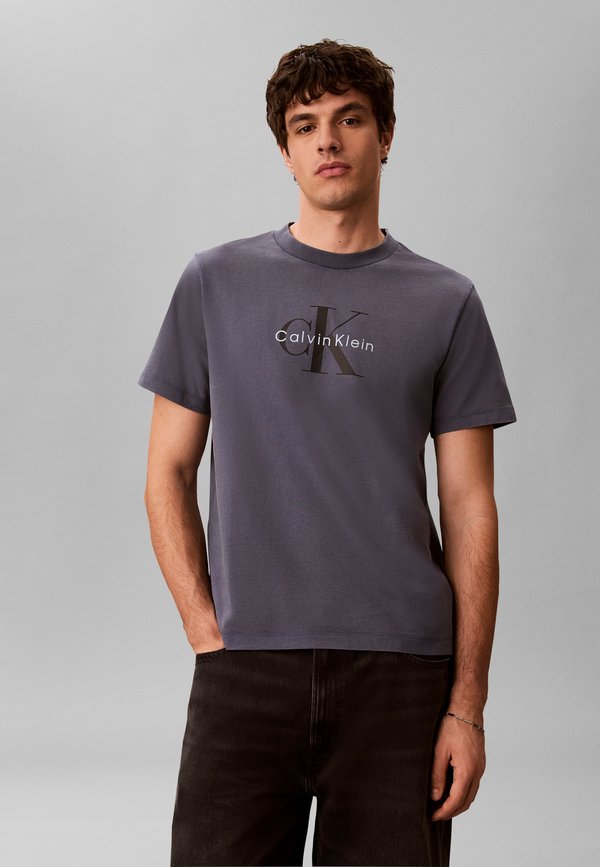 Calvin Klein Jeans SS 20S ACID WASH MONOLOGO GRAPHI - Print T-shirt - blue