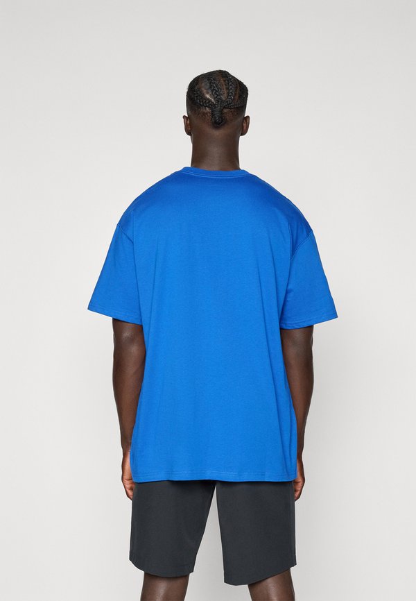 Nike Golf LOOSE FIT