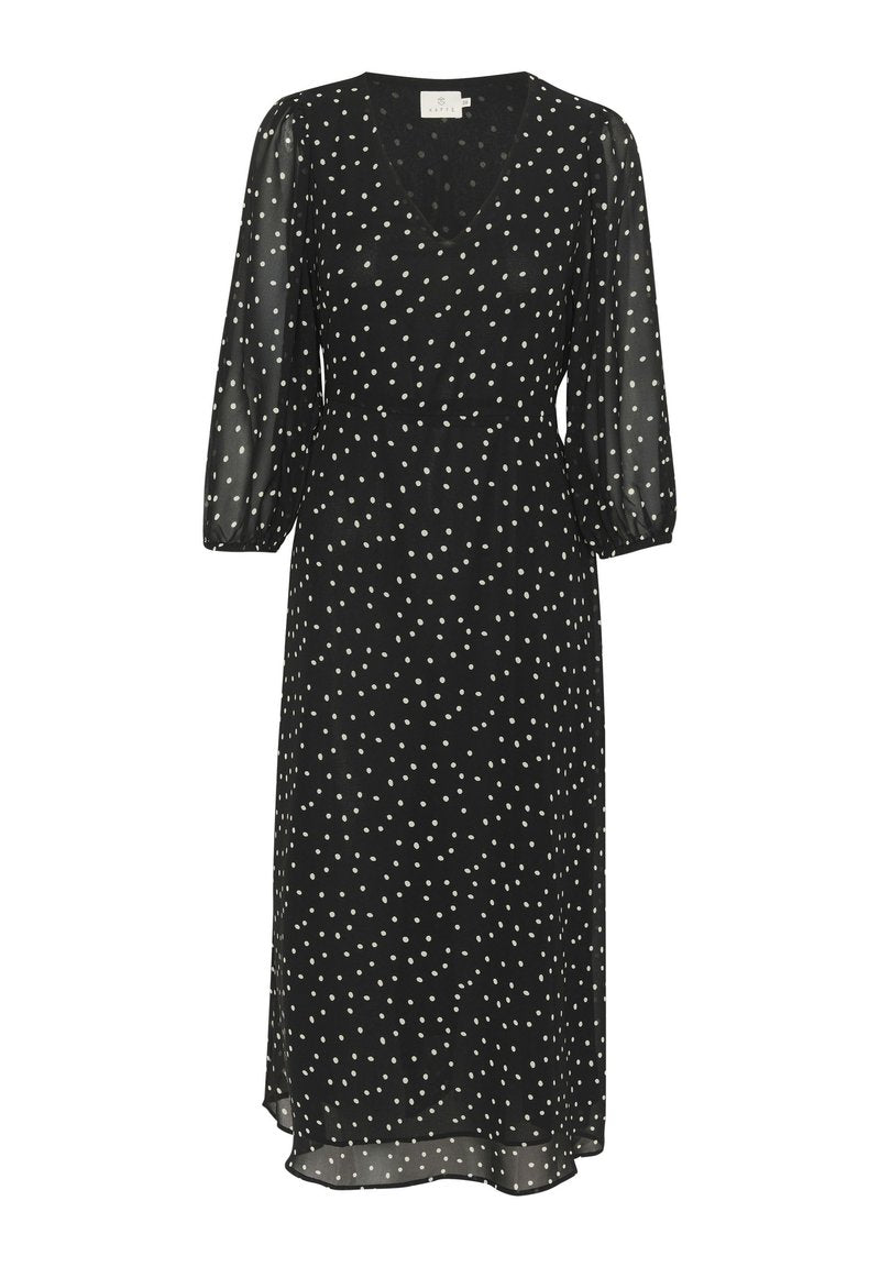 Schwarzes Kleid mit V-Ausschnitt und Dreiviertelärmeln, das mit weißen Punkten verziert ist, aus leichtem Stoff gefertigt und mit einer fließenden Silhouette.