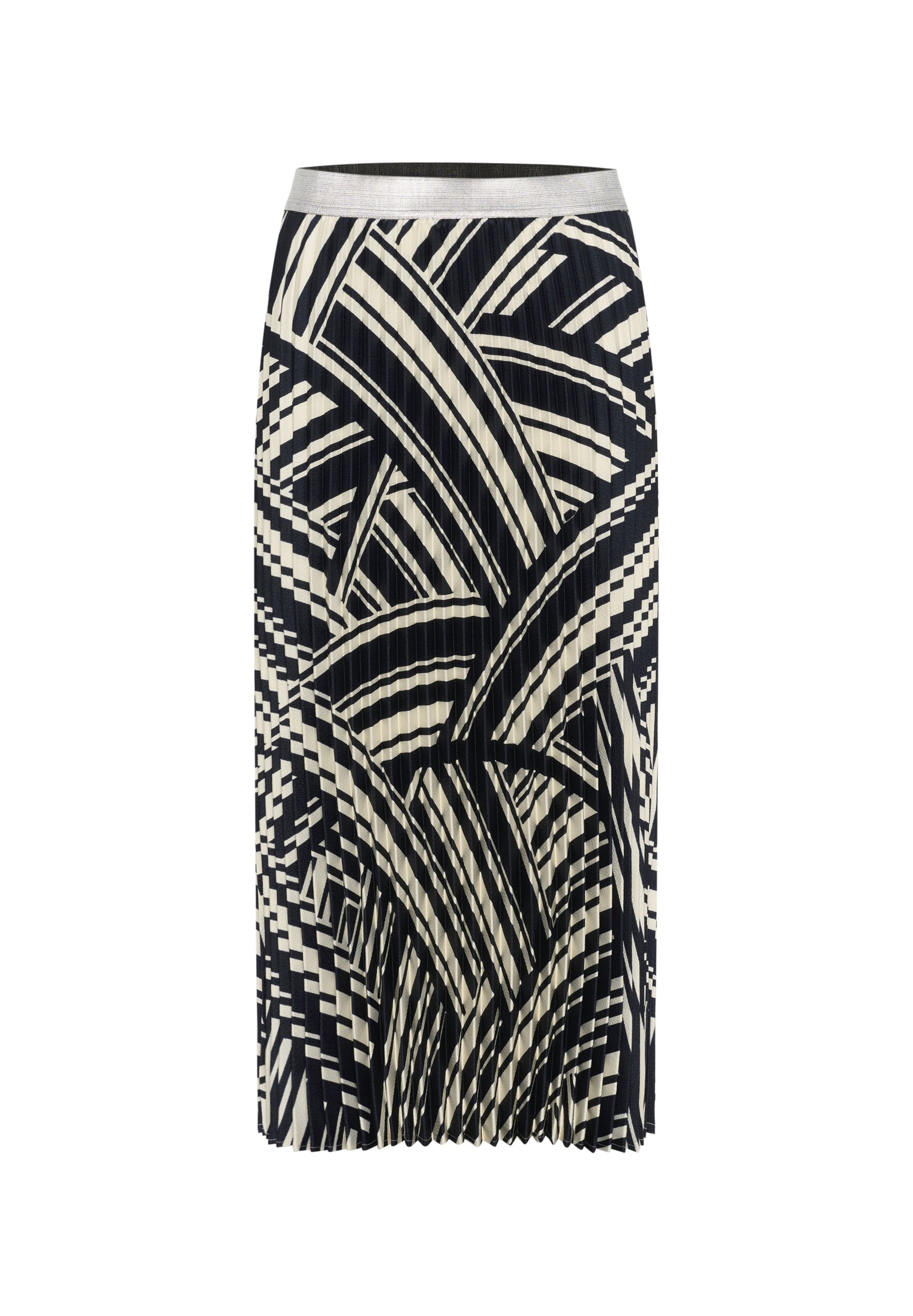Schwarz-weißer plissierter Rock mit einem geometrischen Blattmuster und einem silbernen Taillengummi. Das Design umfasst abwechselnde Formen und Linien.
