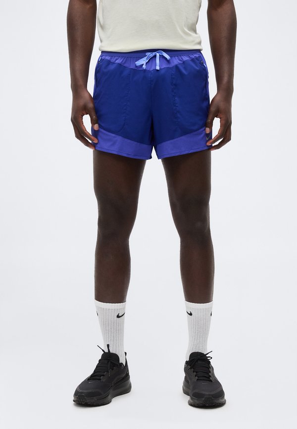 Nike Performance STRIDE SHORT - Sports shorts - deep royal blue/lapis/royal pulse