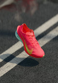 Nike Performance VAPORFLY 4 - Road running shoes - bright crimson/mint foam/cave purple/lime blast