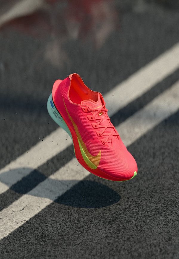 Nike Performance VAPORFLY 4 - Road running shoes - bright crimson/mint foam/cave purple/lime blast