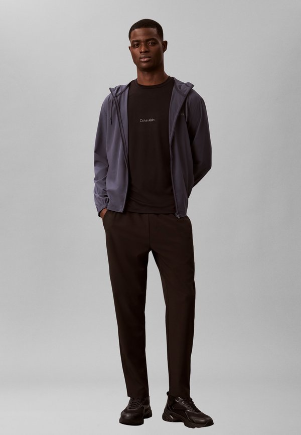 Calvin Klein SPORT PANT UNISEX - Trousers - black