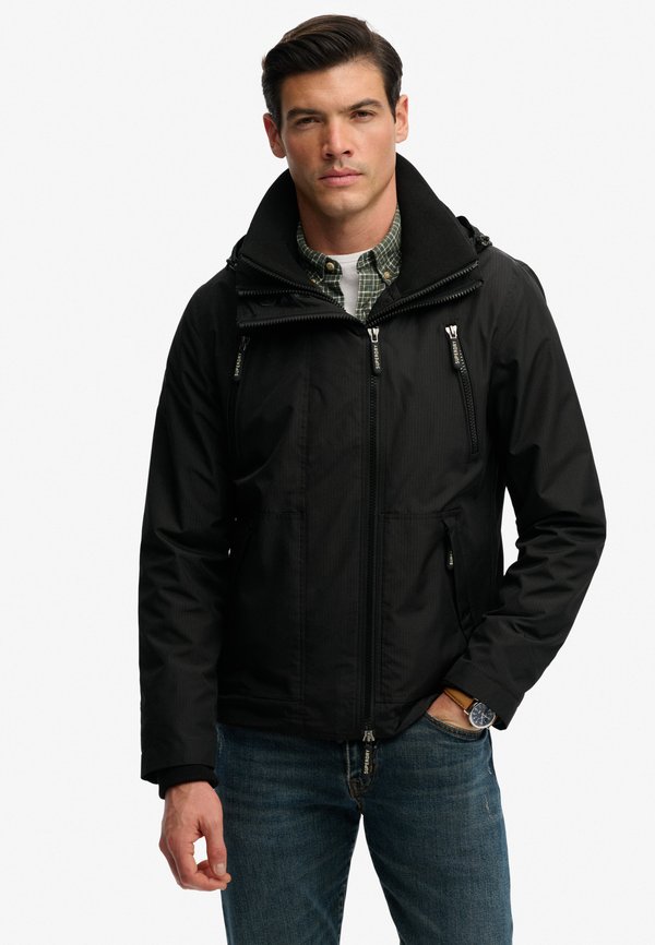 Superdry & Co HOODED MOUNTAIN WINDBREAKER  - Light jacket - black