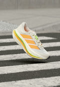 adidas Performance ADISTAR BYD 2 - Road running shoes - cloud white/lucid tangerine/signal green
