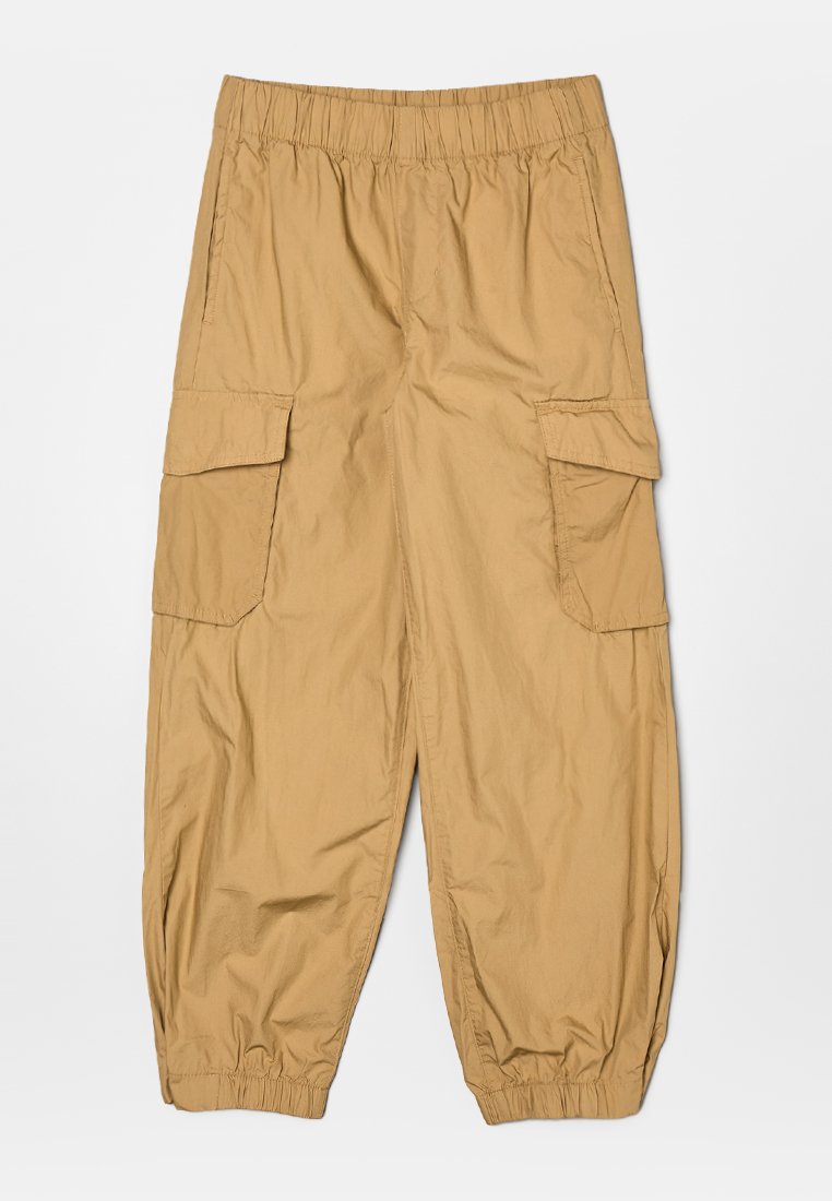 Beige Cargo-Hosen mit elastischem Bund und Bündchen, mit großen Klappentaschen an jedem Oberschenkel, aus leichtem Stoff gefertigt.