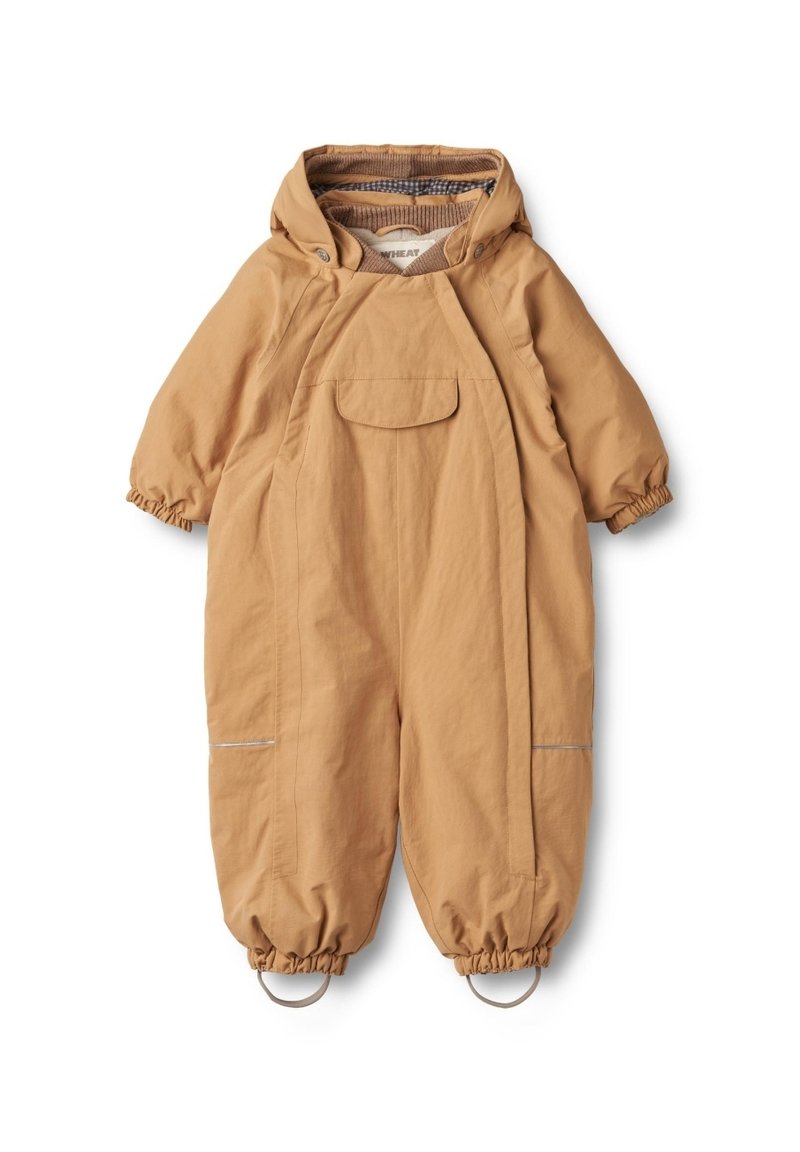 Leichte tanfarbene Latzhose mit Kapuze, elastischen Bündchen, Fronttasche und reflektierenden Akzenten an den Beinen. Strukturierter Stoff.